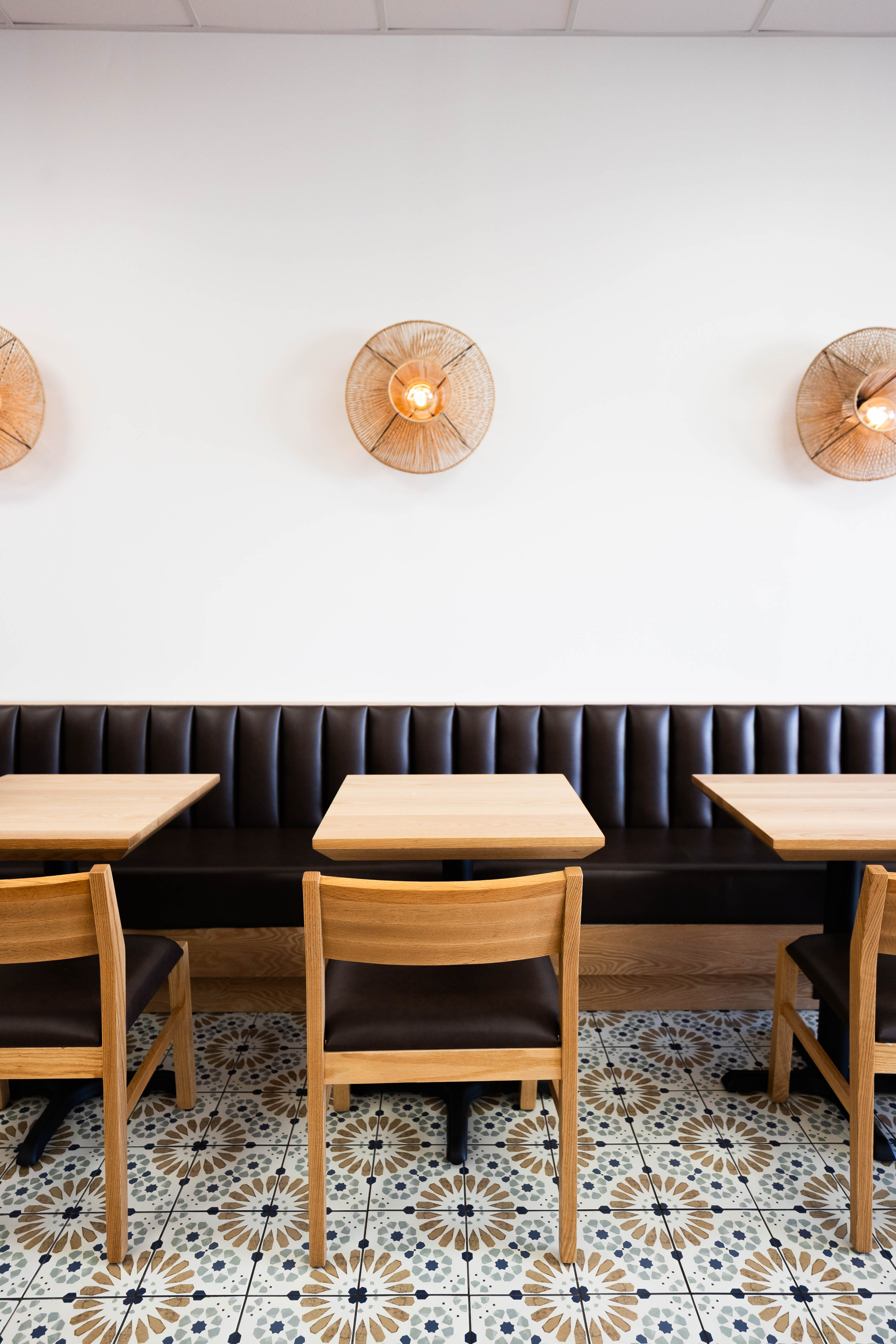 Cozy booth seating inside Xurro